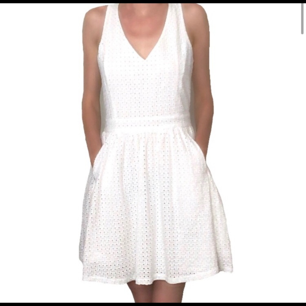 Eyelet first and flare pocket dress